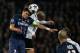 PARIS, FRANCE - MARCH 06: Thiago Silva of PSG and Sofiane Feghouli of Valencia battle for the header during the Round of 16 UEFA Champions League match between Paris St Germain and Valencia CF at Parc des Princes on March 6, 2013 in Paris, France. (Photo by Dean Mouhtaropoulos/Getty Images)