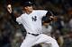 NEW YORK, NY - OCTOBER 13: Derek Lowe #34 of the New York Yankees throws a pitch against the Detroit Tigers during Game One of the American League Championship Series at Yankee Stadium on October 13, 2012 in the Bronx borough of New York City, New York. (Photo by Elsa/Getty Images)