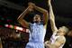 Mar 6, 2013; College Park, MD, USA; North Carolina Tar Heels forward James Michael McAdoo (43) has the ball stripped by Maryland Terrapins center Alex Len (25) at the Comcast Center. Mandatory Credit: Mitch Stringer-USA TODAY Sports