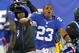 EAST RUTHERFORD, NJ - NOVEMBER 25: Corner back Corey Webster #23 of the New York Giants reacts after intercepting a pass against the Green Bay Packers during a game at MetLife Stadium on November 25, 2012 in East Rutherford, New Jersey. (Photo by Rich Schultz /Getty Images)