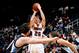 ATLANTA, GA - FEBRUARY 06: Kyle Korver #26 of the Atlanta Hawks shoots a three-point basket against Marc Gasol #33 and Tayshaun Prince #21 of the Memphis Grizzlies at Philips Arena on February 6, 2013 in Atlanta, Georgia. NOTE TO USER: User expressly acknowledges and agrees that, by downloading and or using this photograph, User is consenting to the terms and conditions of the Getty Images License Agreement. (Photo by Kevin C. Cox/Getty Images)