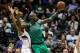 Jan 23, 2013; Atlanta, GA, USA; Boston Celtics power forward Kevin Garnett (5) grabs a rebound over Atlanta Hawks center Al Horford (15) in the second half at Philips Arena. The Hawks won 123-111. Mandatory Credit: Daniel Shirey-USA TODAY Sports