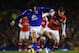 LIVERPOOL, ENGLAND - NOVEMBER 28: Marouane Fellaini of Everton competes with Aaron Ramsey of Arsenal during the Barclays Premier League match between Everton and Arsenal at Goodison Park on November 28, 2012 in Liverpool, England. (Photo by Laurence Griffiths/Getty Images)