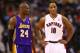 Jan 20, 2013; Toronto, ON, Canada; Los Angeles Lakers guard Kobe Bryant (24) talks to Toronto Raptors forward DeMar DeRozan (10) at the Air Canada Centre. The Raptors beat the Lakers 108-103. Mandatory Credit: Tom Szczerbowski-USA TODAY Sports