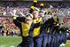 TAMPA, FL - JANUARY 01: The band of the Michigan Wolverines dances on the field before play against the South Carolina Gamecocks in the Outback Bowl January 1, 2013 at Raymond James Stadium in Tampa, Florida. South Carolina won 33 - 28. (Photo by Al Messerschmidt/Getty Images)