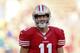 SAN FRANCISCO, CA - OCTOBER 18: Quarterback Alex Smith #11 of the San Francisco 49ers smiles before a game against the Seattle Seahawks on October 18, 2012 at Candlestick Park in San Francisco, California. (Photo by Brian Bahr/Getty Images)