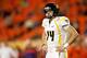 MIAMI GARDENS, FL - JANUARY 04: Paul Millard #14 of the West Virginia Mountaineers looks on against the Clemson Tigers during the Discover Orange Bowl at Sun Life Stadium on January 4, 2012 in Miami Gardens, Florida. (Photo by Mike Ehrmann/Getty Images)