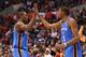 LOS ANGELES, CA - MARCH 03: Serge Ibaka #9 and Kevin Durant #35 of the Oklahoma City Thunder high five late in the game against the Los Angeles Clippers at Staples Center on March 3, 2013 in Los Angeles, California. the Thunder won 108-104. NOTE TO USER: User expressly acknowledges and agrees that, by downloading and or using this photograph, User is consenting to the terms and conditions of the Getty Images License Agreement. (Photo by Stephen Dunn/Getty Images)