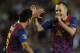 BARCELONA, SPAIN - OCTOBER 19: Andres Iniesta of FC Barcelona (R) celebrates with his teammate Xavi Hernandez after scoring the opening goal during the UEFA Champions League Group H match between FC Barcelona and FC Viktoria Plzen at Camp Nou on October 19, 2011 in Barcelona, Spain. (Photo by David Ramos/Getty Images)