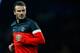 PARIS, FRANCE - MARCH 06: David Beckham of PSG warms up prior to the Round of 16 UEFA Champions League match between Paris St Germain and Valencia CF at Parc des Princes on March 6, 2013 in Paris, France. (Photo by Dean Mouhtaropoulos/Getty Images)