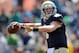 Apr. 21, 2012; South Bend, IN, USA; Notre Dame Fighting Irish quarterback Gunner Kiel (5) throws in the fourth quarter of the spring game at Notre Dame Stadium. Kiel wore the number five jersey in honor of his uncle and former quarterback Blair Kiel who died on April 8, 2012. Mandatory Credit: Matt Cashore-USA TODAY Sports