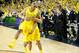 ANN ARBOR, MI - MARCH 03: Trey Burke #3 of the Michigan Wolverines celebrates a 58-57 win over the Michigan State Spartans with Mitch McGary #4 at Crisler Center on March 3, 2013 in Ann Arbor, Michigan. (Photo by Gregory Shamus/Getty Images)