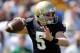 Apr. 21, 2012; South Bend, IN, USA; Notre Dame Fighting Irish quarterback Gunner Kiel (5) throws in the fourth quarter of the spring game at Notre Dame Stadium. Kiel wore the number five jersey in honor of his uncle and former Notre Dame quarterback Blair Kiel who died on April 8, 2012. Mandatory Credit: Matt Cashore-USA TODAY Sports