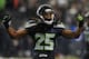 SEATTLE, WA. - DECEMBER 23: Cornerback Richard Sherman #25 of the Seattle Seahawks celebrates a tackle during the fourth quarter of the game against the San Francisco 49ers at CenturyLink Field on December 23, 2012 in Seattle,Wa. The Seahawks won the game 42-13. (Photo by Steve Dykes/Getty Images)