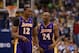 Feb 24, 2013; Dallas, TX, USA; Los Angeles Lakers guard Kobe Bryant (24) speaks with center Dwight Howard (12) during the game against the Dallas Mavericks at the American Airlines Center. Mandatory Credit: Matthew Emmons-USA TODAY Sports