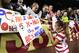 DETROIT, MI - DECEMBER 08: Alex Morgan #13 of Team USA signs autographs for the fans after the game against China at Ford Field on December 8, 2012 in Detroit, Michigan. USA defeated China 2-0. (Photo by Leon Halip/Getty Images)