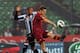 UDINE, ITALY - MARCH 09: Reginaldo De Matos Maicosuel (L) of Udinese Calcio competes with Francesco Totti of AS Roma during the Serie A match between Udinese Calcio and AS Roma at Stadio Friuli on March 9, 2013 in Udine, Italy. (Photo by Dino Panato/Getty Images)
