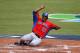 SAN JUAN, PUERTO RICO - MARCH 09: Nelson Cruz #17 of the Dominican Republic scores a run against Spain during the first round of the World Baseball Classic at Hiram Bithorn Stadium on March 9, 2013 in San Juan, Puerto Rico. (Photo by Al Bello/Getty Images)