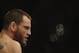SYDNEY, AUSTRALIA - FEBRUARY 27: Jon Fitch of the USA looks across the octagon at BJ Penn of the USA before the start of their welterweight bout part of UFC 127 at Acer Arena on February 27, 2011 in Sydney, Australia. (Photo by Mark Kolbe/Getty Images)