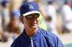 February 25, 2013; Glendale, AZ, USA; Los Angeles Dodgers manager Don Mattingly (8) against the Chicago Cubs during a spring training game at Camelback Ranch. Mandatory Credit: Rick Scuteri-USA TODAY Sports