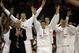Feb 9, 2013; Madison, WI, USA; Wisconsin Badgers head coach Bo Ryan and his team celebrate a Wisconsin three-point basket as their team plays the Michigan Wolverines at the Kohl Center. Wisconsin defeated Michigan 65-62 in overtime. Mandatory Credit: Mary Langenfeld-USA TODAY Sports