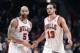 Dec 29, 2012; Chicago, IL, USA; Chicago Bulls power forward Carlos Boozer (5) and center Joakim Noah (13) react after a play against the Washington Wizards during the second half at the United Center. Chicago defeats Washington 87-77. Mandatory Credit: Mike DiNovo-USA TODAY Sports