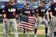 PHOENIX, AZ - MARCH 10: Ryan Braun #8 of USA carries a flag in celebration after defeating Canada 9-4 in the World Baseball Classic First Round Group D game at Chase Field on March 10, 2013 in Phoenix, Arizona. (Photo by Christian Petersen/Getty Images)