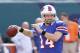 MIAMI GARDENS, FL - DECEMBER 23: Ryan Fitzpatrick #14 of the Buffalo Bills throws the ball prior to the game against the Miami Dolphins on December 23, 2012 at Sun Life Stadium in Miami Gardens, Florida. The Dolphins defeated the Bills 24-10. (Photo by Joel Auerbach/Getty Images)