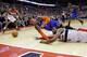 WASHINGTON, DC - MARCH 01: Carmelo Anthony #7 of the New York Knicks and John Wall #2 of the Washington Wizards go after a loose ball during the second half of the Knicks 96-88 win at Verizon Center on March 1, 2013 in Washington, DC. NOTE TO USER: User expressly acknowledges and agrees that, by downloading and or using this photograph, User is consenting to the terms and conditions of the Getty Images License Agreement. (Photo by Rob Carr/Getty Images)