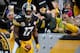 PITTSBURGH, PA - DECEMBER 09: Mike Wallace #17 of the Pittsburgh Steelers reacts with fans after his touchdown in the third quarter against the San Diego Chargers on December 9, 2012 at Heinz Field in Pittsburgh, Pennsylvania. San Diego won the game 34-24. (Photo by Joe Sargent/Getty Images)