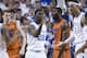 Mar 9, 2013; Lexington, KY, USA; Kentucky Wildcats forward Alex Poythress (22) and forward Willie Cauley-Stein (15) celebrate against Florida Gators center Patric Young (4) and center Erik Murphy (33) in the second half at Rupp Arena. Kentucky defeated Florida 61-57. Mandatory Credit: Mark Zerof-USA TODAY Sports