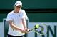 INDIAN WELLS, CA - MARCH 12: Sam Querrey returns a shot to Marinko Matosevic of Australia during the BNP Paribas Open at the Indian Wells Tennis Garden on March 12, 2013 in Indian Wells, California. (Photo by Matthew Stockman/Getty Images)