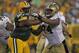 GREEN BAY, WI - SEPTEMBER 08: B.J. Raji #90 of the Green Bay Packers rushes against Jermon Bushrod #74 of the New Orleans Saints during the NFL opening season game at Lambeau Field on September 8, 2011 in Green Bay, Wisconsin. The Packers defeated the Saints 42-34. (Photo by Jonathan Daniel/Getty Images)
