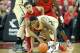 LOUISVILLE, KY - MARCH 09: Peyton Siva #3 of the Louisville Cardinals and Eric Atkins #0 of the Notre Dame Fighting Irish battle for a loose ball during the game at KFC YUM! Center on March 9, 2013 in Louisville, Kentucky. (Photo by Andy Lyons/Getty Images)