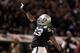 OAKLAND, CA - DECEMBER 06: Tommy Kelly #93 of the Oakland Raiders celebrates after making a tackle against the Denver Broncos at O.co Coliseum on December 6, 2012 in Oakland, California. (Photo by Ezra Shaw/Getty Images)