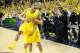 ANN ARBOR, MI - MARCH 03: Trey Burke #3 of the Michigan Wolverines celebrates a 58-57 win over the Michigan State Spartans with Mitch McGary #4 at Crisler Center on March 3, 2013 in Ann Arbor, Michigan. (Photo by Gregory Shamus/Getty Images)