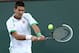 INDIAN WELLS, CA - MARCH 10: Novak Djokovic of Serbia hits a return to Fabio Fognini during day 5 of the BNP Paribas Open at Indian Wells Tennis Garden on March 10, 2013 in Indian Wells, California. (Photo by Stephen Dunn/Getty Images)