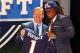 NEW YORK, NY - APRIL 26: Dont'a Hightower of Alabama holds up a jersey as he stands on stage with NFL Commissioner Roger Goodell after he was selected #25 overall by the New England Patriots in the first round of the 2012 NFL Draft at Radio City Music Hall on April 26, 2012 in New York City. (Photo by Al Bello/Getty Images)