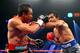 LAS VEGAS, NV - DECEMBER 08: (R-L) Manny Pacquiao throws a left at Juan Manuel Marquez during their welterweight bout at the MGM Grand Garden Arena on December 8, 2012 in Las Vegas, Nevada. (Photo by Al Bello/Getty Images)