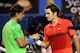 MELBOURNE, AUSTRALIA - JANUARY 26: Roger Federer of Switzerland and Rafael Nadal of Spain embrace at the net after their semifinal match during day eleven of the 2012 Australian Open at Melbourne Park on January 26, 2012 in Melbourne, Australia. (Photo by Lucas Dawson/Getty Images)