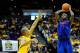 BATON ROUGE, LA - JANUARY 12: Kenny Boynton #1 of the Florida Gators shoots over Charles Carmouche #0 of the LSU Tigers during a game at the Pete Maravich Assembly Center on January 12, 2013 in Baton Rouge, Louisiana. Florida won the game 74-52. (Photo by Stacy Revere/Getty Images)