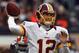 CLEVELAND, OH - DECEMBER 16: Quarterback Kirk Cousins #12 of the Washington Redskins throws a pass as he is pressured by defensive lineman Juqua Parker #95 of the Cleveland Browns at Cleveland Browns Stadium on December 16, 2012 in Cleveland, Ohio. (Photo by Matt Sullivan/Getty Images)