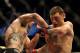 February 4, 2012; Las Vegas, NV, USA; UFC fighter Carlos Condit (left) fights against Nick Diaz (right) during UFC 143 at the Mandalay Bay Events Center. Carlos Codit defeated Nick Diaz. Mandatory Credit: Kelvin Kuo-USA TODAY Sports