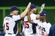 Mar 12, 2013; Miami, FL, USA; United States third baseman David Wright (5) and shortstop Jimmy Rollins (11) celebrate their victory over Puerto Rico at Marlins Park. United States defeated Puerto Rico 7-1. Mandatory Credit: Scott Rovak-USA TODAY Sports