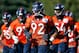 ENGLEWOOD, CO - JULY 26: Defensive end Elvis Dumervil #92 of the Denver Broncos leads the defensive linemen during training camp at the Paul D. Bowlen Memorial Broncos Centre at Dove Valley on July 26, 2012 in Englewood, Colorado. (Photo by Doug Pensinger/Getty Images)