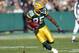 GREEN BAY, WI - NOVEMBER 19: Greg Jennings #85 of the Green Bay Packers carries the ball during the game against the New England Patriots on November 19, 2006 at Lambeau Field in Green Bay, Wisconsin. The Patriots defeated the Packers 35-0. (Photo by Jonathan Daniel/Getty Images)