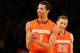 NEW YORK, NY - MARCH 15: (L-R) Michael Carter-Williams #1 and Brandon Triche #20 of the Syracuse Orange react in overtime against the Georgetown Hoyas during the semifinals of the Big East Men's Basketball Tournament at Madison Square Garden on March 15, 2013 in New York City. (Photo by Al Bello/Getty Images)