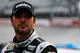 BRISTOL, TN - MARCH 15: Jimmie Johnson, driver of the #48 Lowe's/Kobalt Tools Chevrolet, stands on the grid during qualifying for the NASCAR Sprint Cup Series Food City 500 at Bristol Motor Speedway on March 15, 2013 in Bristol, Tennessee. (Photo by Jared Wickerham/Getty Images)