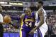November 21, 2012; Sacramento, CA, USA; Los Angeles Lakers guard Kobe Bryant (24) attempts to drive past Sacramento Kings guard Tyreke Evans (13) in the first quarter at the Power Balance Pavilion. Mandatory Credit: Cary Edmondson-USA TODAY Sports