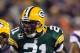 GREEN BAY, WI - JANUARY 05: Safety Charles Woodson #21 of the Green Bay Packers reacts in front of quarterback Joe Webb #14 of the Minnesota Vikings after the Packers stop the Vikings on third down forcing a field goal in the first quarter during the NFC Wild Card Playoff game at Lambeau Field on January 5, 2013 in Green Bay, Wisconsin. (Photo by Andy Lyons/Getty Images)